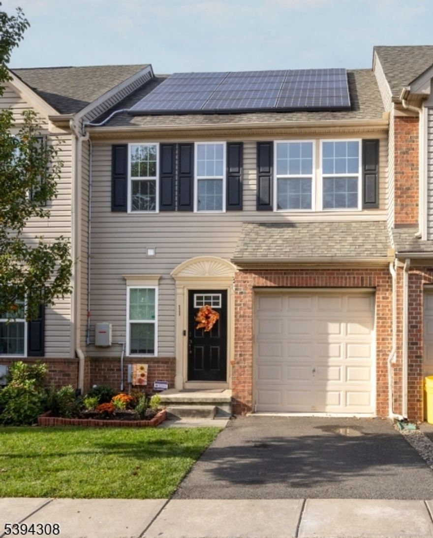 Best deal in Mercer County! 3 BR and 3.5 Baths. Primary is an ensuite with full bath and WIC.  All rooms are generous sized rooms and more storage then anyone could need. Convenient 2nd floor laundry. Fresh paint and new carpeting. 1st floor has recessed lighting, plantation shutters and an open concept. The finished basement has one of the full baths and could be used as an extra guest room/playroom/office. The finished garage has an EV charger. Private backyard patio area with PVC fencing.  Solar credits until 2036. Seller will pay off the solar panels. Low HOA. Close to shopping, train station, airport, restaurants and major highways. This home is a win win!