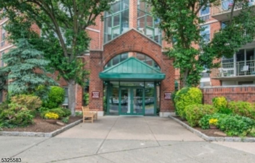 Upscale 2BR/2FB condo in the highly desired community The Mill at Little Falls! An open & bright layout of rooms all on one level. Wood flooring in every room, walk-in closets, 2 private balconies, laundry in unit, covered parking garage w/reserved spot. Beautiful grounds to explore & waterfalls to enjoy plus amenities such as pool, gym, tennis, etc. An ideal location with transportation/bus stop across the street, train station a block away and restaurants, shops & stores very close!
