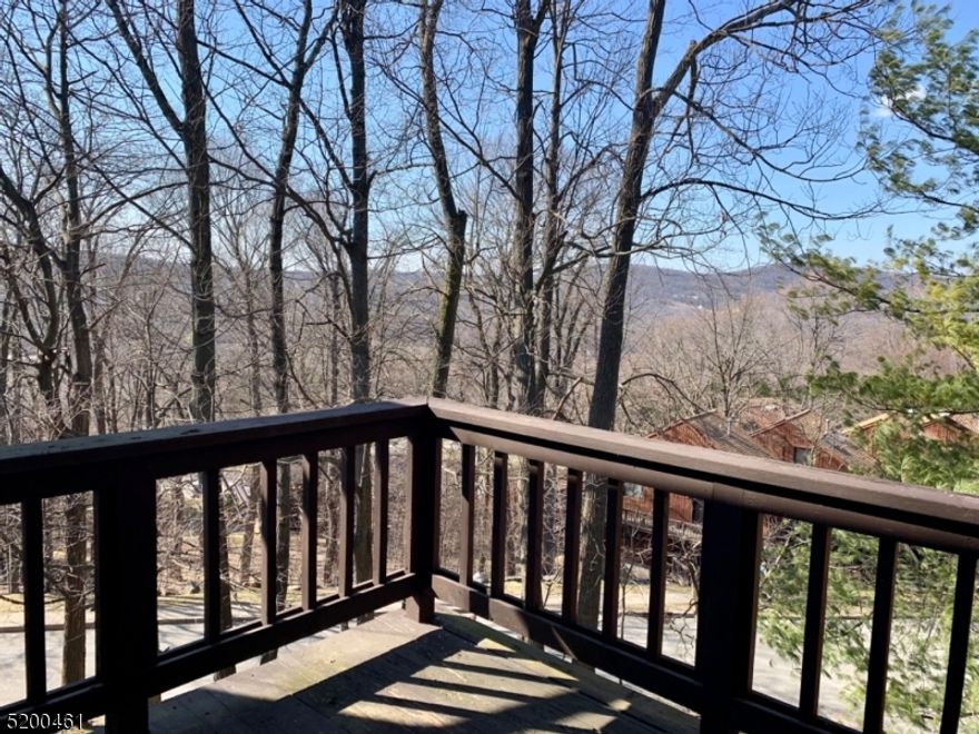 Lovely and recently renovated, this 2-bedroom, 2-bath condo offers a bright and inviting living space with vaulted ceilings and skylights that flood the unit with natural light. New flooring and freshly carpeted stairs add to the modern feel, while the open floor plan and cozy fireplace create a warm and welcoming atmosphere. Enjoy breathtaking valley views from your private deck, perfect for relaxing outdoors. This apartment includes an in-unit washer/dryer, and dishwasher for added convenience. Located in a gated community with a pool, this home is just minutes from skiing, golf, swimming, hiking, restaurants, shopping, and major highways. One small dog is allowed with an additional $50 monthly rent (breed restrictions apply). Don't miss this fantastic opportunity, welcome home! Public water, public sewer and natural gas.