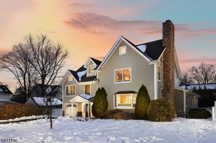 Nestled in a picturesque neighborhood, this beautifully updated split-level home offers four spacious levels of thoughtfully designed living. A welcoming foyer sets the tone and includes convenient access to a full bathroom. Just a few steps up, the formal living room is highlighted by a bay window & wood burning fireplace. The living room flows into the formal dining room, the ideal setting for hosting gatherings. At the heart of the home is the impressive kitchen & family room addition, designed for both everyday living & entertaining. The EIK is appointed w/granite countertops, SS appliances & center island breakfast bar w/sink & wet bar. The adjoining sun-filled family room features oversized windows that bathe the space in natural light. A bright breakfast room provides the perfect casual dining space. Upstairs, you'll find three bedrooms and a full hall bath. Privately situated on its own level, the primary suite addition offers a luxurious retreat w/private bath featuring a jetted tub, glass-enclosed stall shower, dual-sink vanity, private commode, WIC & in-suite laundry.The extended finished lower level provides addl living space, incl a rec room, bonus room, office, full bath, and laundry room. Outside, the landscaped grounds include a fenced backyard with deck & extended patio. Completing the home is a one-car attached garage.Ideally located close to shopping, schools & NYC trans, this exceptional home offers the perfect blend of space, style & modern convenience.