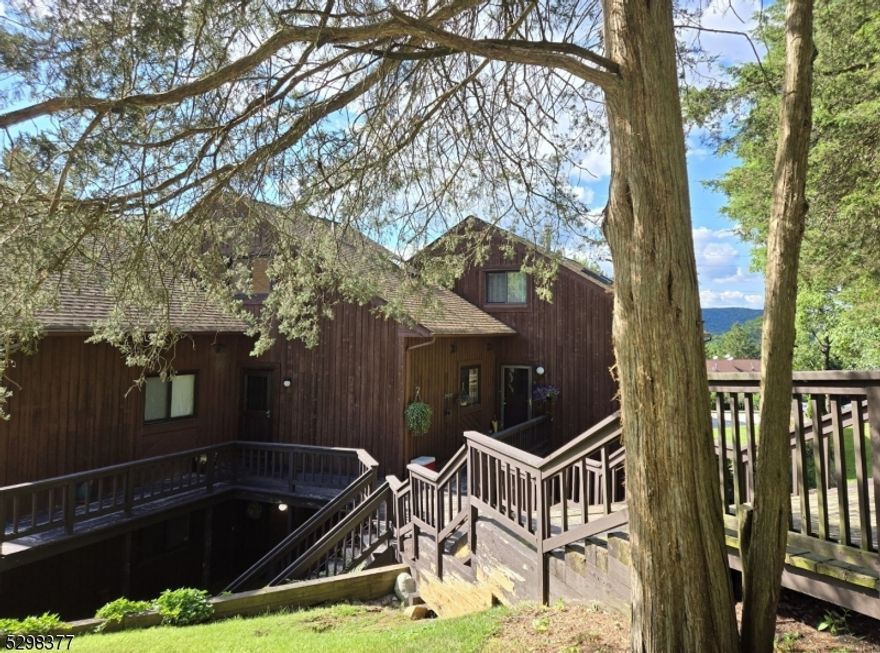 Located in beautiful Vernon Township, this two-level townhome offers much for you to appreciate. Enter into the main level with a galley style kitchen, bedroom, full bath, and open living/dining room area with vaulted ceilings and glass slider door to the deck. Spiral stairs take you up to the bedroom loft with skylight, sunny window, wood beam ceiling feature, and ceiling fan. New furnace and A/C. Professionally painted. Add your own touches and move right in for year-round living or as a relaxing getaway to the natural beauty this area has to offer. Enjoy the community pool, playground, nearby skiing, water park, mountain biking, golfing, and the Appalachian Trail. Great Gorge is a gated community, so you must check in for showings.