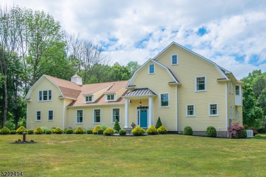 Graceful living among idyllic surroundings in this beautifully renovated custom home updated with unmatched quality construction, exceptional finishes & decor situated on 3+acres in the rolling hills of Chester. The well-designed floor plan is enhanced by finely detailed custom millwork including extensive moldings, cabinetry, and built-ins throughout. The 3-yr old gourmet kitchen will inspire gastronomic delights! Designed for those who love to cook & entertain boasting Thermador appliances, quartz island with prep sink, shiplap accents, & California Closet pantry. The space opens to a great room warmed by a gas fireplace with 15ft ceilings, accent windows and French doors that open to a paver patio for easy indoor-outdoor entertaining. Celebrate special occasions in uncrowded comfort in the dining room with sitting area and fireplace. Stylish mudroom with built-ins and butler's pantry. 1st floor primary BR#1 with gas fireplace, walk-in California closet & luxury bath with soaking tub & steam shower. 3 en suite bedrooms on the 2nd floor include primary bedroom #2 with huge walk-in closet, fireplace & ensuite bath with soaking tub & dual vanity. 2nd staircase to private bonus room with full bath and adjacent office. Partially finished basement with powder room for added living space. Bucolic & private treelined property suitable for a horse or 2. A rural feel yet minutes from historic Chester, shopping, Routes 206/24/10, NYC train, eclectic Morristown dining & event venues.