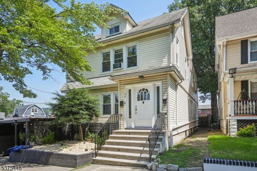 Don't miss this fantastic, move-in ready oversized 2 bedroom apartment in prime South Orange location -- convenient to both South Orange and Maplewood villages, train stations, schools, parks, restaurants, and shops. Beautiful hardwood floors throughout, arched doorways, spacious rooms, and lots of light. This first floor unit features a bright living room with walk in closet and adjacent light-filled family room or flexible home office space. Formal dining room off of the eat-in kitchen with dishwasher. There are two good sized bedrooms and an updated full bath. Freshly painted throughout, shared backyard, and tons of storage - move right in and enjoy!