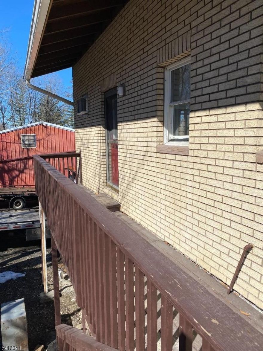 Apt located in the rear of Bud & Walts Service center.