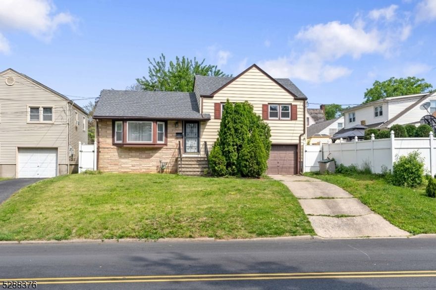 Welcome to your new home, where comfort and convenience harmonize in perfect balance. This single-family split-level residence offers an inviting atmosphere and a layout designed for modern living. As you step inside, you're greeted by a spacious open floor plan that seamlessly integrates the living room, dining room, and kitchen. Natural light floods the space, enhancing the warm ambiance and creating an inviting environment for gatherings. The kitchen, thoughtfully designed with functionality in mind, boasts ample counter space and modern appliances, making meal preparation a breeze. Second floor with 3 cozy and spacious bedrooms, including a master suite complete with a full bath featuring a luxurious jetted tub. For additional living space, head downstairs to discover a spacious family room with half a bath, perfect for movie nights, game days, or simply lounging. This versatile area offers endless possibilities for entertainment and relaxation. Step outside to the expansive backyard, where a lush green lawn provides the perfect setting for outdoor activities and gatherings. Conveniently attached to the home is a one-car garage, providing secure parking and additional storage space for your belongings. Located in a peaceful neighborhood, this home offers the perfect combination of tranquility and convenience, with schools, parks, shopping, and dining options just moments away. Don't miss out on the opportunity to make this house your home!