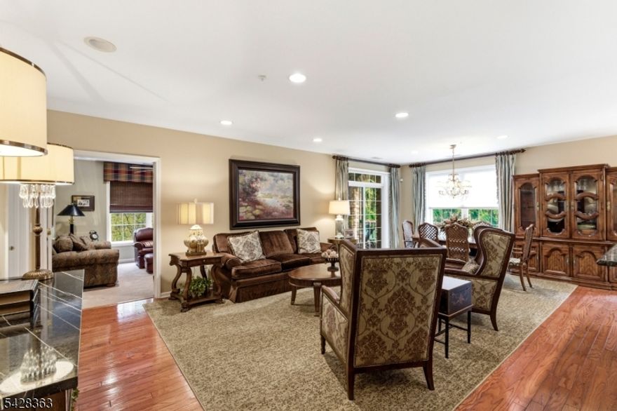 Welcome to 2104 Johnson Drive, located in the sought-after 55+ community of Fox Hills in Rockaway. This beautifully updated corner end-unit offers a sense of space, light, and privacy that's hard to find. The Windsor E model features an updated kitchen and a beautifully renovated primary bath, along with an open, airy primary bedroom complete with custom closet shelving for added storage and organization. You will find thoughtful details throughout, including hardwood flooring, high-hat lighting, and custom window treatments, giving you everything you're looking for and allowing you to unpack and move right in. One of the most special features is the private balcony. Surrounded by trees and lush greenery, it's a quiet, tucked-away space where you can relax, unwind, and enjoy the peaceful setting. Living in Fox Hills is about more than just the home; it's a lifestyle. From the beautifully maintained grounds and active clubhouse to tennis, pickleball, greenhouse gardening, and a full calendar of activities, there's always something to enjoy. The community also offers a convenient jitney service and easy access to major highways, public transportation, restaurants, and local attractions. This is a place where you can truly enjoy your surroundings, stay active, meet new friends, and socialize. Come experience the lifestyle you deserve.