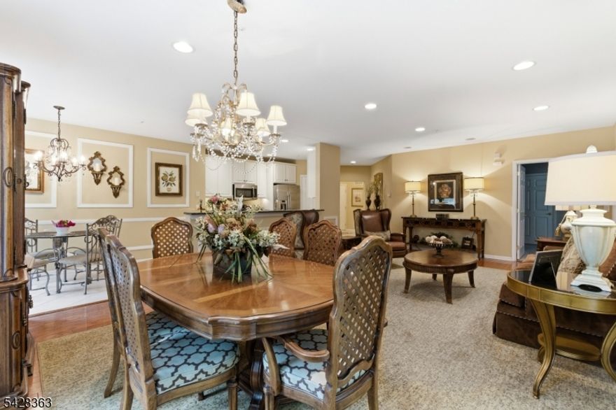 Welcome to 2104 Johnson Drive, located in the sought-after 55+ community of Fox Hills in Rockaway. This beautifully updated corner end-unit offers a sense of space, light, and privacy that's hard to find. The Windsor E model features an updated kitchen and a beautifully renovated primary bath, along with an open, airy primary bedroom complete with custom closet shelving for added storage and organization. You will find thoughtful details throughout, including hardwood flooring, high-hat lighting, and custom window treatments, giving you everything you're looking for and allowing you to unpack and move right in. One of the most special features is the private balcony. Surrounded by trees and lush greenery, it's a quiet, tucked-away space where you can relax, unwind, and enjoy the peaceful setting. Living in Fox Hills is about more than just the home; it's a lifestyle. From the beautifully maintained grounds and active clubhouse to tennis, pickleball, gardening in the greenhouse, and a full calendar of activities, there's always something to enjoy. The community also offers a convenient jitney service,  along with easy access to major highways, public transportation, restaurants, and local attractions. This is a place where you can truly enjoy your surroundings, stay active, meet new friends, and socialize. Come experience the lifestyle you deserve.