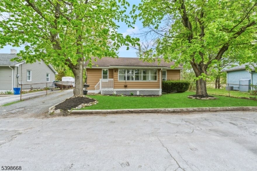 Welcome to 47 Bridge St in Ogdensburg. This well-maintained 3-bedroom, 1-bath ranch is situated on a quiet cul-de-sac on a level lot backing to woods. The home features a 3-season enclosed porch, a spacious attic for additional storage, and a basement with a dedicated laundry room and a large secondary room for storage. Conveniently located approximately 10 minutes from Route 15 and 6 minutes from Route 23, making it ideal for commuters.  There is no home purchase contingency, allowing for a straightforward closing timeline. This home is priced to sell and should not be missed.