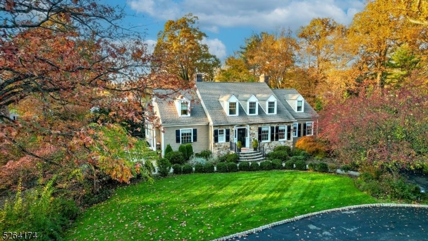 Proximity, privacy, and pride of ownership come together in this custom-built 4 BR, 2 FB, 2 HB home. Renovated to meet today's design standards, this home sits on a quiet cul de sac w/in walking distance to top-rated schools, town, & NY direct train. A 2 story, bright foyer & center hall lead you to an entertainer's dream come true. LR & DR are large & flooded w/light. LR has wood-burning FP & custom bookshelves. Renovated designer KIT w/Thermador appliances, custom cabinetry, wine fridge, coffee bar w/direct h2o line, GORGEOUS teak bar area with glass upper cabinets and imported tile backsplash. A generous center island is the heart of the room. The FR seamlessly flows from the kitchen. Off of the FR is a sun-drenched bonus room. Think: yoga, homework, or 2nd office. Off of this incredible living space is a vast patio with 2 sections including gas-ready area for a firepit. Primary wing includes an office, spacious BR & luxurious, designer bath boasting 2-sided gas FP, free-standing tub, large shower, double vanity, and radiant floors. 2nd flr hosts 3 large BRs and a bonus area perfect for hanging out or homework. State-of-the-art 2nd flr BA has double vanity & multifunctional wet room w/ free standing tub & shower. Walk-out, bright, updated basement has   bath, wine room, mudroom, and large utility space.  Oversized 2 car garage, large turnaround driveway. Professionally landscaped, irrigation system on this flat & private lot.