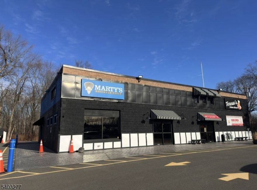 Large Store Front. Left Side. Exceptionally clean and versatile multi-level commercial space. Offers flexible leasing options in a well-maintained mixed-use building. Space may be leased individually or combined, allowing tenants to tailor the layout to their operational needs. Formerly Marty's Bike Shop. 2,050 sq ft Lower Level. 4,000 sq ft Upper Level. Features include separate entrances, multiple bathrooms, private offices, and professionally installed systems throughout. Lower Level offers great retail space and ADA-accessible restroom. Upper level offers two offices, 2 additional bathrooms (1 with shower), and potential for ancillary use such as administrative space, meetings, or specialty functions. Layout allows areas to be fully closed off for independent use, with separate code compliance. Property has undergone thoughtful improvements. Fully hardwired with security cameras, and maintained to a high standard. Ideal for retail, service, office, or specialty users seeking flexibility, clean infrastructure, and a landlord open to collaborative leasing solutions. Long-term leases considered. Great visibility on Ridgedale Avenue. Plenty of parking, easy access to major highways. Interior Images and Floor Plan coming soon! Current tenant-occupied Restaurant on the Right Side.