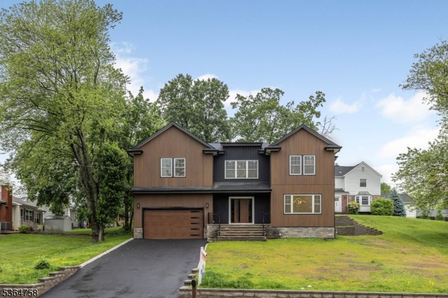 Luxurious Custom-Built Estate in Prestigious Neighborhood of Westfield. Step into this meticulously crafted custom-built estate that epitomizes luxury and elegance. This high-end property boasts five spacious bedrooms and five and a half opulent bathrooms, offering an unparalleled living experience. Interior Features: Master Suite: An expansive, luxurious master suite with a spa-like bathroom and walk-in closets. Gourmet Kitchen: Equipped with high-end appliances, custom cabinetry, and a large center island, perfect for entertaining and culinary delights. Living Spaces: Enjoy cozy evenings by the fireplace in the media room or host sophisticated gatherings in the formal dining room.  Exterior Features: Garage and Storage: Ample parking with a spacious garage and additional storage. Landscaping: Professionally landscaped grounds provide a serene and private outdoor oasis. This exquisite property is a testament to superior craftsmanship and sophisticated design. Experience the epitome of high-end living in this elegant and timeless home.