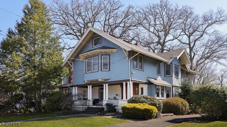 Stunning Craftsman-inspired Colonial with an expansive columned front porch and timeless architectural charm, blending early 20th-century character with thoughtful updates. Situated on desirable Lenox Ave, one of Westfield's classic residential streets known for distinctive homes, and its walking distance to the vibrant downtown, parks & NYC transportation. A deep full-width front porch serves as a welcoming architectural centerpiece, ideal for relaxing & entertaining. Classic shingle siding, dormer details and bay window enhance the home's exceptional curb appeal.The 1st level offers an expansive layout designed for both everyday living and entertaining. A gracious formal living room w/fireplace flows seamlessly into the formal DR.The updated kitchen w/custom cabinets, connects conveniently to a butler's pantry and adjacent family room. Then a private office/den provides more flexible space. Large windows fill the home with natural light, while preserving its architectural character. The 2nd level boasts 4/5 spacious bedrooms, a full hall bath, and a primary suite w/ private bath.The 3rd floor offers an additional bedroom/bonus room w/skylights,2 storage rooms and more closets.The finished basement includes a recreation room, bonus room, separate laundry room, storage and convenient side entrance.Lastly, a private backyard offers a deck plus patio and 2-car detached garage. A rare opportunity to own a home with such character in a prime Westfield location.