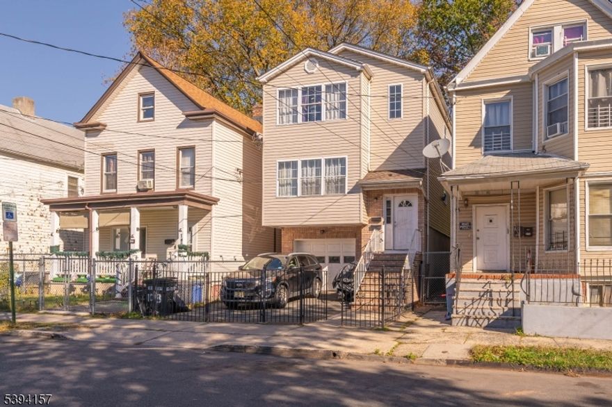 Beautiful and well-maintained two-family home built in 2000, offering a total of 8 bedrooms and 5 full bathrooms. This move-in-ready property is located in Elizabeth and provides excellent income-producing potential for both owner-occupants and investors.First Floor Unit: Features 3 spacious bedrooms, 2 full bathrooms, an open living/dining layout, and a functional kitchen.Second Floor Unit: Includes 3 bright bedrooms, 2 full bathrooms, an open living/dining combo, and a well-appointed kitchen.Finished Basement: Offers 2 bonus rooms, 1 full bathroom, and additional space ideal for recreation, storage, or extended living needs.The home has been impeccably maintained and is in mid-to-excellent condition throughout. Roof was  replaced this year, providing added value and peace of mind.