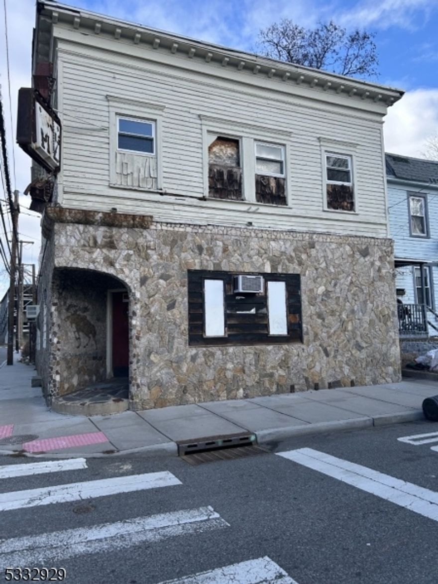 Mix used property consisting of 1 3 bedroom apartment over a non operating bar being sold with liquor license. Conveniently located to public transportation including the Orange and Highland Ave Train entrance. The area has major development and construction surrounding this once in a lifetime opportunity to purchase a building with a very limited amount of liquor licenses available in the entire State of New Jersey.
