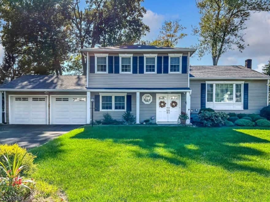 Stunning! Not a thing to do but unpack.  Completely updated split in fantastic subdivision offers all modern conveniences and location is a bonus!  Highlights include recessed lighting, updated white kitchen with granite counter tops, center island, stainless appliances, range hood and is open to dining room with sliders to deck.  Hardwood flooring, completely updated bathrooms, pull down stairs to attic storage, paved 2 car wide driveway, new deck and roof in 2020, thermal windows, newer sliding glass doors, moldings throughout, private, level yard, humidifier and media filter, central air, built-in shelving, shed with electric and wood fence complete the package!