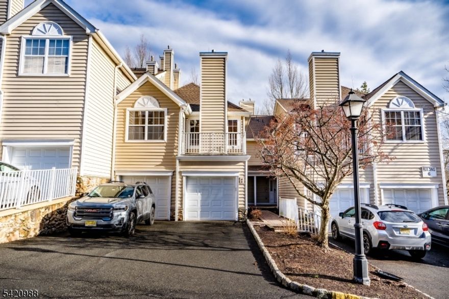 Welcoming and stunning two-bedroom, 2.5 baths townhouse at the Villas in Berkeley Heights. Inviting ground level with great size foyer, lots of closet space and access to the garage and partial basement with storage. The main level features a spacious living room with tons of natural light plus a gas fireplace perfect for winter days, modern kitchen with granite counter tops and plenty of cabinet space. Convenient powder room, laundry room and dining area with access to the balcony also on main level for convenience. Second floor with two great size bedrooms and two full baths. Master bedroom with walk- in closet, ensuite bathroom with soaking tub and double sinks. Newer washer and dryer. Central AC and heating, two zones. Garage for one car and private driveway plus visitor parking available in complex. Close proximity to downtown with access to train station and public transportation. Available now. No smokers or pets allowed. Tenant pays for all utilities. Background, credit check a must as well as employment verification.