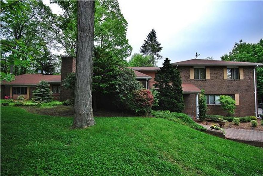 This hidden gem is nestled in the well-sought-after Cedarbrook Area. Bring your vision to this one.. A few strategic upgrades can turn this home into an even greater find. Bask in the summer breeze under the beautiful cherry blossom tree that greets you as you saunter into the living room. The living room room has hardwood floors and a fireplace yearning to be restored to its awesomeness... A lovely archway leads into the dining room, as the hardwood floors continue. The dining room leads to the hallway, where the main bath separates two generously sized bedrooms. The second floor features two additional amply appointed bedrooms. This home surprises you with such spaciousness. This home features a plethora of conversion options. The basement is large enough to create a great room, home gym, play room, game room, or media room; the possibilities are numerous. Easy access to major highways, shopping areas,  and county parks,