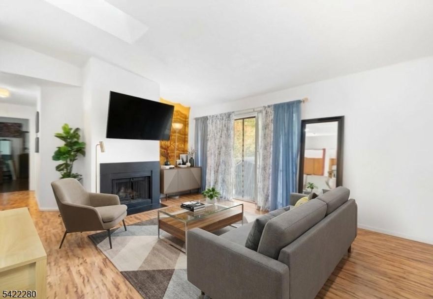 Step into this beautifully maintained 3rd-floor, level condo in the desirable Society Hill community, where comfort and convenience come together effortlessly. As you enter, you're welcomed by a bright and inviting open-concept living and dining area, perfect for both relaxing evenings and entertaining guests, featuring a cozy woodburning fireplace as its focal point and sliding doors that lead to a private balcony an ideal spot to enjoy your morning coffee or unwind at the end of the day. The home offers laminate flooring throughout for a clean, modern look with easy maintenance, while the kitchen is equipped with classic wooden cabinetry that provides ample storage and functionality for everyday living. This thoughtfully designed layout includes two generously sized bedrooms, including a primary suite with its own full bath, along with a second full bathroom both featuring tubs for added comfort and versatility. An in-unit laundry area adds convenience to daily routines, and residents of Society Hill enjoy access to amenities such as a clubhouse, outdoor pool, playground, and tennis courts, making this well-kept condo a perfect blend of comfort, practicality, and community living.