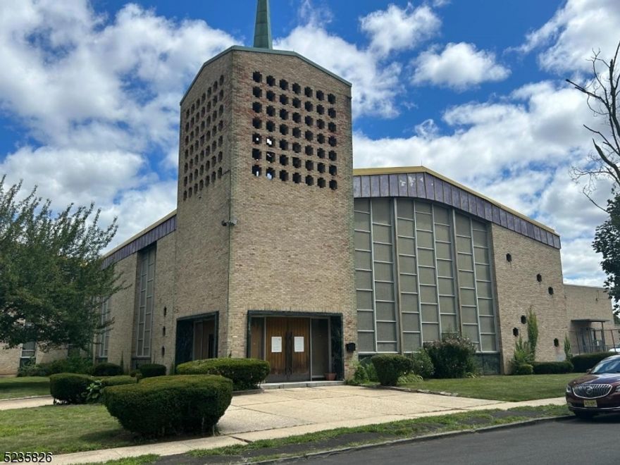 A modern full service building with marble pulpit, stained glass windows, seating approximately 1,000 people and parking for approximately 75 cars with an overflow lot. included is a large building/Rectory with multi car garage located on the attached lot at 209 Fourth Ave. E.O. (No additional fee). Must be discreet!CALLING ALL INVESTORS!!  This is a lot of 1.3 acres, can tear down an build apartments in an upcoming area where people are migrating from NY. Close to Train Station, gym and shopping.