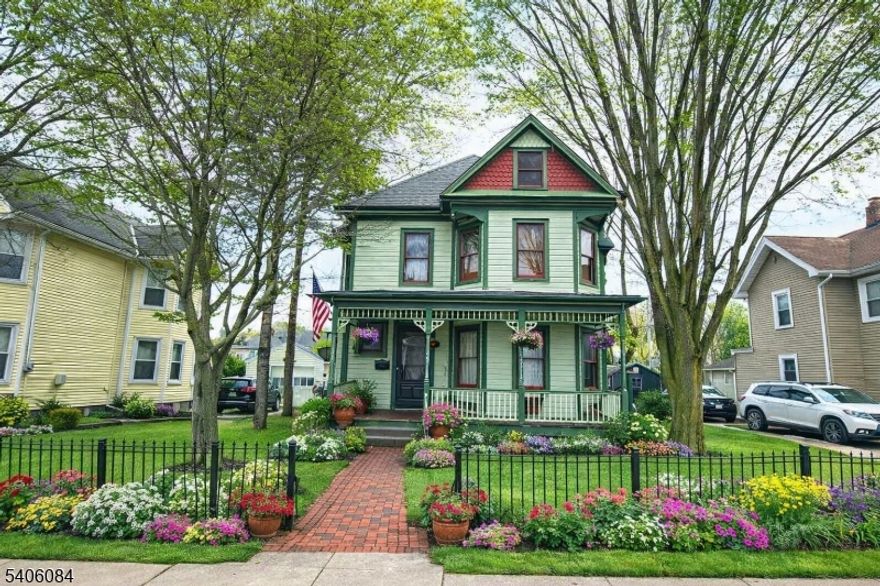 DIAMOND IN THE ROUGH! STEP BACK IN TIME WITH THIS STUNNING 1890S VICTORIAN PAINTED LADY, READY TO BE RESTORED TO HER ORIGINAL GRANDEUR. FROM THE MOMENT YOU ARRIVE, YOU'LL BE CAPTIVATED BY THE ORNATE DENTIL MOLDING, FRETWORK, DECORATIVE BRACKETS, AND INTRICATE PORCH RAILINGS THAT DEFINE HER TIMELESS EXTERIOR. INSIDE, HISTORIC CHARM ABOUNDS: AN ETCHED GLASS FRONT DOOR WITH ORIGINAL TURN STYLE DOORBELL, A GRAND FOYER WITH SWEEPING MAIN STAIRCASE FEATURING INTRICATELY CARVED NEWEL POSTS AND BALUSTERS, RAISED PANELING, AND BEAUTIFULLY DETAILED CARVED TRIM THROUGHOUT THE MAIN FLOOR. ADDITIONAL HIGHLIGHTS INCLUDE WOOD-FRAMED WINDOWS AND BASEBOARDS, A BUILT-IN ANTIQUE CHINA CABINET AND HUTCH, A WOOD-BURNING FIREPLACE IN THE DINING ROOM, ORIGINAL DOOR HARDWARE WITH KNOBS, KEY PLATES AND KEYS , STAINED GLASS WINDOWS AND REAR DOOR, TWO SETS OF POCKET DOORS, AND A CLASSIC CAST-IRON CLAW-FOOT TUB. ENJOY THE CONVENIENCE OF PAVED REAR PARKING ACCESSED BY A PRIVATE ROAD, A SPACIOUS BACKYARD, A WELCOMING FRONT PORCH, AND A REAR PORCH WITH THE ORIGINAL "BUTLER'S ENTRANCE  AND BACK STAIRCASE LEADING TO THE SECOND FLOOR. THE FULL WALK-UP ATTIC OFFERS ENDLESS POTENTIAL FOR ADDITIONAL LIVING SPACE. OPPORTUNITIES LIKE THIS ARE RARE DON'T MISS YOUR CHANCE TO TRANSFORM THIS PAINTED LADY INTO YOUR FOREVER HOME. IDEALLY LOCATED NEAR MAJOR HIGHWAYS (I-80 & ROUTE 46), TRANSIT, SHOPPING, DOWNTOWN, AND SCHOOLS. THIS IS TRULY A MUST-SEE!