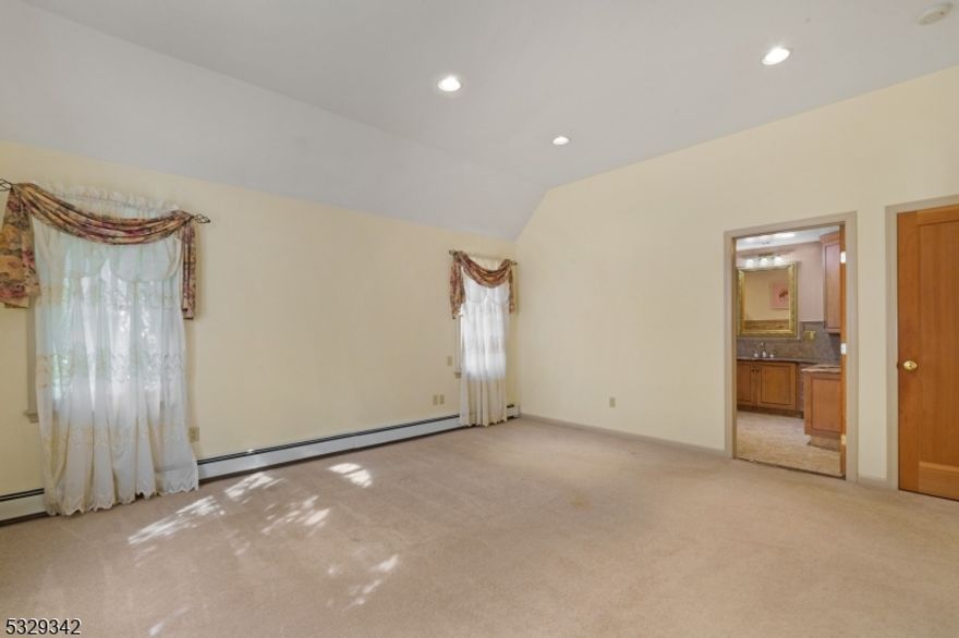 WONDERFUL CUSTOM HOME SITUATED ON A  7.68 ACRE TREE FARM IN THE MIDDLE OF LONG VALLEY.  CAN CONTINUE THE CURRENT USE AS A LANDSCAPING/ NURSERY, OR THIS LEVEL LOT WOULD BE GREAT FOR HORSES.  Buyer to do their due diligence with the township.  This custom home features a 20' x 20' gourmet kitchen with 8' island and s/s appliances.  The 22' x 14' dining room can fit all of your guests. The family room boast a cozy stone fireplace. The primary bedroom and primary bath are on the 1st floor.   Second floor consists of two more bedrooms and main bath. The full finished walkout lower level adds an abundance of additional space.   There is a two car garage as well as a  52' x 38' out building with electric.  Property is supplied by natural gas.  Public water is at the street.  This is a must see property !   Includes access to the highly rated Long Valley school system.