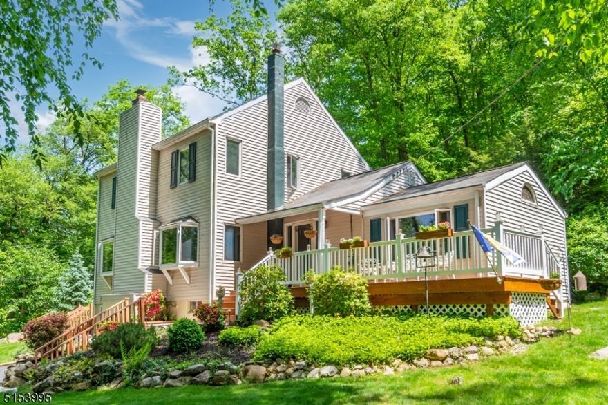 An oasis of peace, privacy & personality! Charming Colonial situated on a quiet Cul-De-Sac in Great Neighborhood backed against Jonathan's Woods which includes 635 protected green acres. Enjoy bright, spacious living w/the privacy of nature. This unique property offers a functional layout. Lots of Generous Room Sizes to Spread Out & Make Your Own! Beautiful HW Floors. BRIGHT living space; HUGE LR/DR Combo. Brick faced fireplace w/Wood burning Timberline stove. Functional, Galley Kitchen w/Solid wood cabinetry & eating area. Gorgeous family room which boasts cedar shiplap, cathedral ceiling, beams, industrial fixtures & stained glass. A room you'll want to spend your time in! 1st floor bdrm & full bath. Upstairs, 2 bdrms & bath including master suite w/jacknjill access to bath & walk-in closet. Supersized bsmt offers finished space & powder room. Laundry, workshop & plenty of storage - plus 1 Car Garage, Walk up attic & 2 storage sheds. Great outdoor space.. Backyard is large, wooded and private. Perfect spot to enjoy nature, mature trees/perennials, lawn, landscape & garden- relaxing! Choose to spend your summer evenings on the back deck or front deck. Trust me, you can't go wrong. Located just steps from walking/hiking trails. Easy access to Downtown Denville, NYC Direct train/bus & major hwys. Denville living at its best!