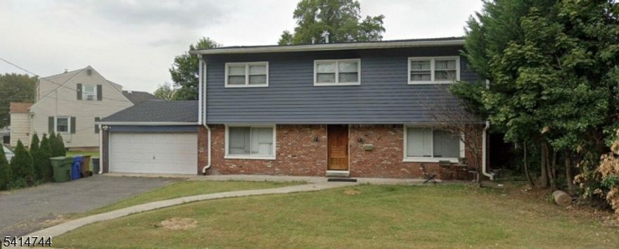 Beautiful home located in the desirable Sunnyside section of Linden offering space, comfort, and a fantastic location. Kitchen features granite countertops, modern cabinetry, and stainless-steel appliances. Bathrooms and hardwood floors throughout the home add warmth and character. Spacious layout with living room, dining room, family room, and kitchen, plus 4 bedrooms including a huge primary suite with walk-in closet and 2.5 bathrooms. Additional features include a 2-car garage and a large basement with tiled flooring and sump pump, ready to be finished. Enjoy a gorgeous oversized private fenced backyard perfect for entertaining or relaxing outdoors. Conveniently located near shopping, transportation, and the Garden State Parkway. NJ Transit Bus to NYC (Line 112) stops right across the street, making commuting easy.