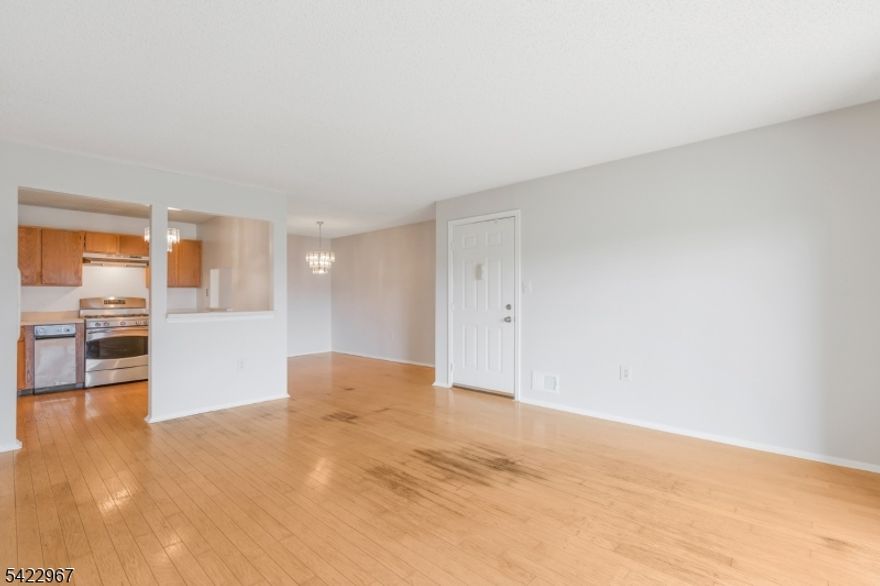 Sunny ground floor unit set up on a hill offering privacy and light. HW floors in LR,DR, hall, new carpet in primary bedroom. Solid wood doors , stainless steel appliances , freshly painted interior. Close to schools, shopping, transportation.