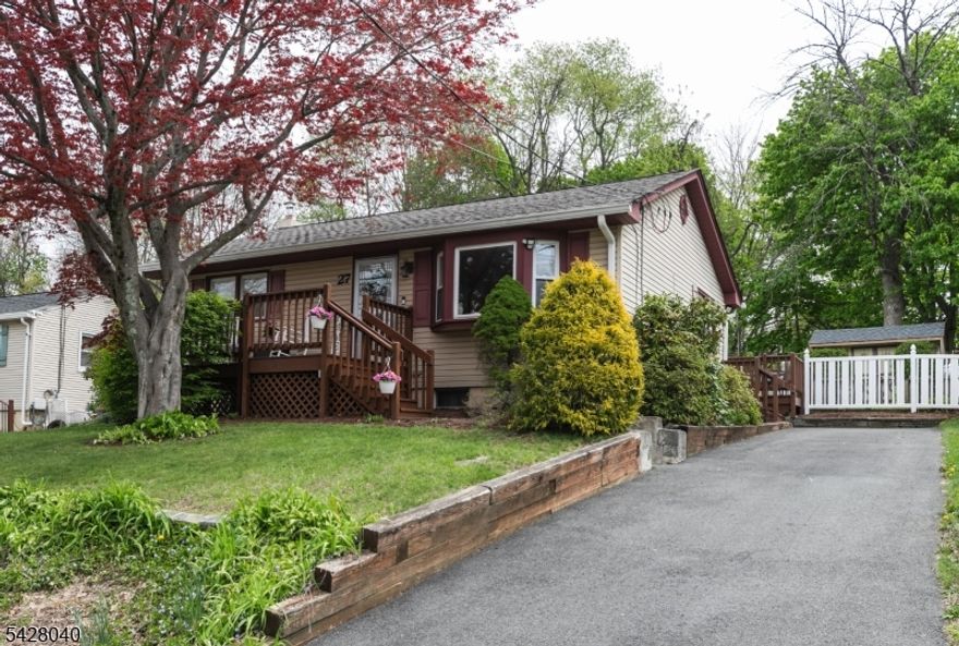 HIGHEST & BEST FRIDAY MAY 8 @ 1pm.  Located in a quiet, nature-filled lake community, this adorable two-bedroom, one-bath home is perfect for a first-time buyer or anyone looking to downsize. Sunlight pours into the inviting living room, creating a warm and relaxing space that flows seamlessly into a nicely sized eat-in kitchen. The main level also features two generously sized bedrooms and an updated bathroom.  Downstairs, you'll discover even more living space, including a spacious recreation room, a dedicated playroom, and an additional office or potential bedroom, along with ample storage.  Step outside to enjoy a large deck and a flat, fenced-in backyard that backs to peaceful woods. From the yard, you can take in year-round views of the lake, adding to the home's charm and tranquility.  Enjoy all that this wonderful lake community has to offer, including seasonal activities and a welcoming neighborhood atmosphere. This is a home you won't want to miss.