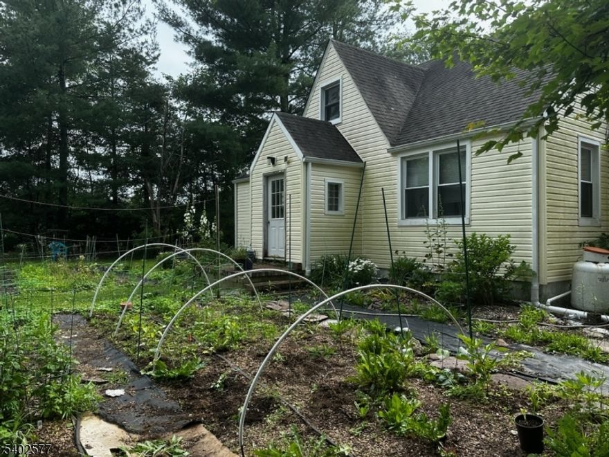 Here is a very interesting home on 1.4 rural acres. Newer septic tank with well water. The home has a large kitchen  with a formal dining area. There is a first floor laundry room and family room  also with 1 bedroom and a newer bath. Upstairs  there are 2 good sized bedrooms. There is a large detached garage and u-shaped driveway. The home has oil fired baseboard heat with the above ground oil tank located in the detached garage. The cooking and the dryer are fueled by propane. water softener is owned. Closing must coincide with sellers move. Price to sell. Great opportunity for country living in a wonderful area.