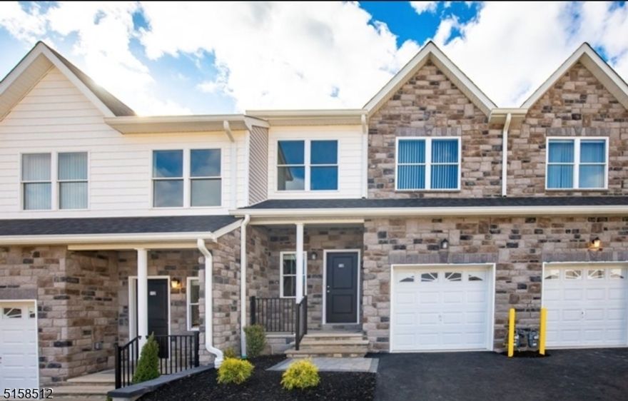 This unit is coming available!!!! New development, an absolute rarity on the market and for sure not to remain around for long!  Walk into the double story foyer with an open concept floor plan.  Bright and airy. Hardwood floors downstairs with a fireplace and deck in the main living room. Upstairs will be fully carpeted.  Two bedrooms featuring a large master bedroom with large master bathroom and large walk in closet. Second bedroom is a very generous size featuring a full bathroom!  This ideal location, while nestled in the mountain landscape of Morris County is also a commuter's dream - close to various NJ transit buses and trains, and all major highways, including Route 287, Route 46 and Route 10 - you are only 30 miles away from NYC!Complex uses their own application and lease process.  Please do not use NTN or any other application.