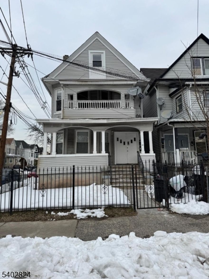 Recently Renovated - Two Family Home - Located near Park Avenue Elementary School - near Garden State Parkway & Orange Train Station - Features Hardwood Floors, Granit Kitchen & much more