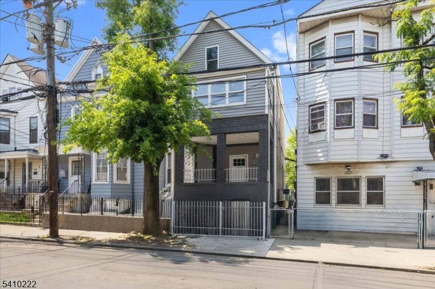 Great opportunity to own a completely renovated three-family property in a convenient Newark location.  Each unit features an eat-in kitchen, spacious living room areas, and comfortable bedrooms, making this property an attractive option for tenants.Unit 1: 3 bedrooms, eat-in kitchen, and a living roomUnit 2: 3 bedrooms, eat-in kitchen, living room, and a office Unit 3: 1 bedroom, eat-in kitchen, living room. This property also features a spacious unfinished basement, offering plenty of potential. Perfect for both owner-occupants and investors seeking rental income, it's conveniently located near shops, schools, parks, and public transportation. Situated in a well-established neighborhood, this home offers excellent accessibility and long-term value. Don't miss out schedule your showing today!