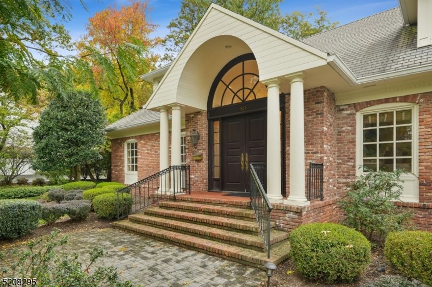 Beautiful 1.1 acre park-like estate artfully framed by tall trees and manicured shrubbery, ideally located in the heart of OLD Short Hills. This builder's personal home - was totally rebuilt in 1993 with a brand"new underground electric service, new wiring of the entire house, new plumbing. It was renovated again in 2010 and 2014. Oversized windows bring in plenty of sunlight and a spectacular view of the backyard. This custom home featuring 5 bedrooms, 5.2 baths, from its grand domed entrance to living room, dining room, spacious family room, library, and in-law suite, William Ohs custom cabinetry kitchen and solarium breakfast area open to backyard large patio provide space for al fresco dining. The 2nd floor boasts a luxurious master suite with a gorgeous tray ceiling, 3 other bedrooms and 3 bathrooms. Master Bedroom has walk-in closet, sitting room and spa-like Master Bath with jacuzzi and steam shower. Finished lower level connect to 4 over-sized garages, 2 units central AC and heat can be operated by 8 zone thermostats to keep different temperatures with individual comfort needs, two water heaters, owned water softener and fire sprinkler in utility room, central vacuum. Wired sound system throughout the inside and outside of home. Minutes to Hartshorn Elementary School, train, town, & parks.