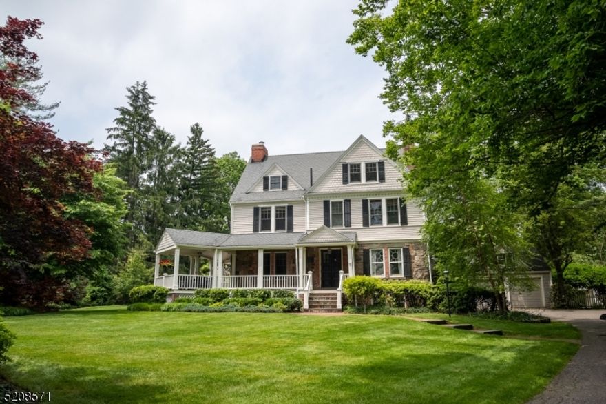 Classic 6-bdrm HARTSHORN home nestled on LARGE, LEVEL YARD (.71 acre) in prestigious enclave of Old Short Hills. Peaceful, park-like grounds steps from South Pond full of mature plantings & trees includes generous, wrap-around porch w/gazebo seating & bead brd ceilings, brick walkways & patios. The 1st floor boasts 9.5 foot ceilings, lg modern eat-in kitchen flowing to Great rm w/cathedral ceilings. Enter through the double glass front drs to vestibule & foyer w/3-story staircase w/original chestnut banister. This elegantly proportioned home built in 1885 has thoughtful & tasteful additions & upgrades plus lots of original details & charm!  The light-filled home has ALL new Anderson architect series wood windows (except 2 original DR sunburst windows) & radiant floor heating. The formal DR and LR both have gas FPs. Second flr has 9' ceilings, primary suite, 2 bdrms, hall bath & laundry rm. The generous primary suite includes bath w/clawfoot soaking tub & shower, dressing/sitting rm & walk-in closet. Up to the 3rd flr for 3 bdrms & full bath. An oversized mudroom leads to attached double garage w/electric car charger & lg 2nd level w/possibilities for expansion. Walk-out basement is partially finished with plenty of room to play & exercise. A new, meticulous, top-to-bottom paint job complete this move-in ready home. And don't miss the Wendy house waiting for new playmates, new (2021) gas fire pit & vintage weather vane!