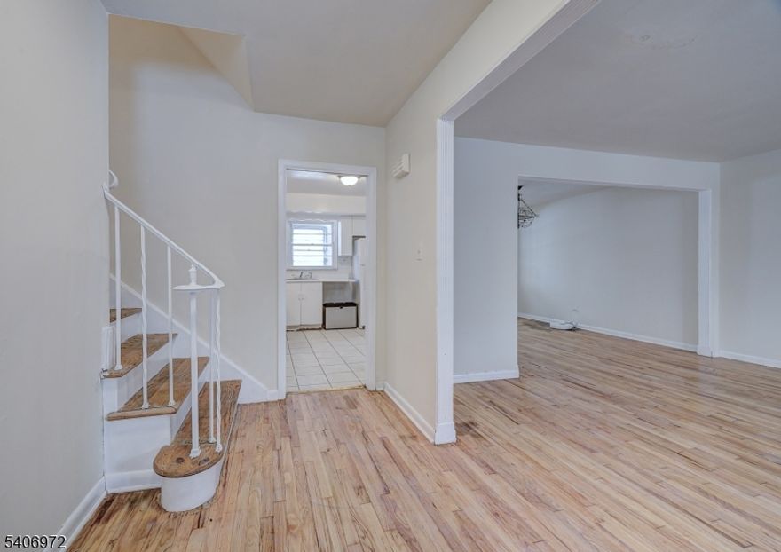 Amazing opportunity to modernize this mother-daughter house and make it your home! The ground level was once used as a doctors professional office and now features 2 separate entrances, separate kitchens, bathrooms & bedrooms. Located at the border of Livingston and down the street from Cooperman Barnabas Medical Center, public transportation into NYC, houses of worship and 3 separate downtown shopping corridors. Opportunity knocks at this prime location home!