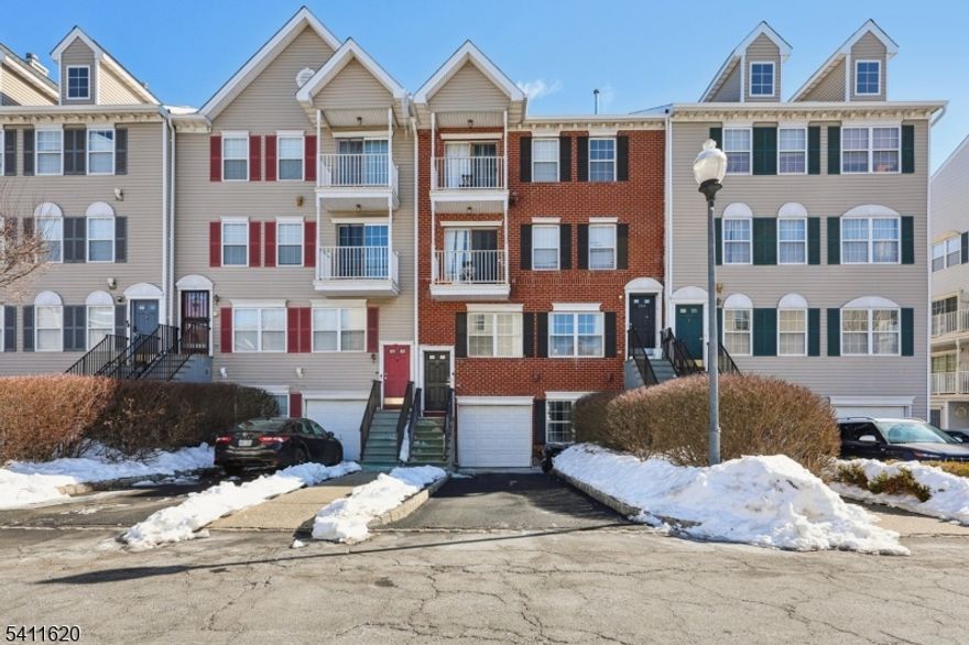 This beautifully renovated townhouse is a true commuter's dream, perfectly situated in the highly sought-after Society Hill Community. Enjoy unmatched convenience just moments from local restaurants, shopping, recreational parks, the Prudential Center, NJPAC, Whole Foods, the Newark Museum, major highways, and public transportation.Located next to Newark Penn Station, this home offers an easy NYC commute reach Manhattan in as little as 20 minutes by train.This bright and spacious unit features an open-concept layout with three large bedrooms, three full bathrooms, and a modern kitchen seamlessly flowing into the living and dining areas. Additional highlights include a recreation room, private balcony, central HVAC for year-round comfort, and ample parking with a garage, driveway, and additional parking.Residents enjoy exclusive access to community amenities, including a clubhouse, tennis courts, swimming pool, and convenient on-site public transportation.A rare opportunity to own a fully renovated townhouse in one of Newark's most desirable communities perfect for commuters and city lovers alike!