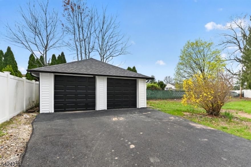 Stunning fully renovated Cape Cod-style home set on an oversized lot in desirable East Hanover. Taken down to the studs and completely rebuilt, this move-in ready home offers the peace of mind of all-new major systems including a new roof, HVAC system, hot water heater, electrical, plumbing, windows, and siding. Blending timeless curb appeal with modern designer finishes, the bright and spacious interior features wide-plank hardwood flooring, recessed lighting, and an ideal layout for today?s lifestyle.The show-stopping galley kitchen is beautifully appointed with granite countertops, full granite backsplash, custom cabinetry, stainless steel appliances, pantry storage, and direct access to a functional mudroom with built-in cubbies. The first level offers the kitchen, two generously sized bedrooms, and a stylish full bathroom.Upstairs, the private primary suite serves as a true retreat with a gorgeous spa-like bathroom and spacious walk-in closet. A second upstairs bedroom and convenient half bath provide added flexibility for guests, or office space.The full finished basement adds exceptional bonus living space perfect for a recreation room, gym, playroom, or media area. Outside, enjoy a large yard, long newly paved driveway, and detached two-car garage. Conveniently located near top-rated schools, parks, shopping, dining, and major highways, this turnkey home offers luxury finishes, thoughtful design, and modern systems all in one exceptional package.