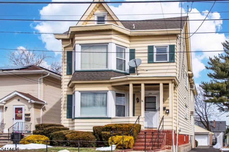 Well-maintained two-family home in Clifton's desirable Albion section offering space, flexibility, and convenience. Centrally located just one block to NYC Express bus transportation , School 5 , shops , restaurants including Dunkin Donuts. Commuters dream near Routes 80,19,3,46, 23 and the GSP. Each unit features a spacious, light-filled living room, formal dining room, eat-in kitchen, two bedrooms, and full bath. Large windows provide abundant natural light . Partial views of the NYC skyline and nearby Garrett Mountain Reservation, just steps away for hiking and outdoor activities.The finished walk-out basement offers additional living space including a family room, den/office, summer kitchen with wet bar, full bath, and separate laundry areas for each unit.Walk-up attic from main hallway includes two additional rooms ideal for storage or future expansion. Exterior features include a long driveway with ample parking, backyard patio, and detached two-car garage.