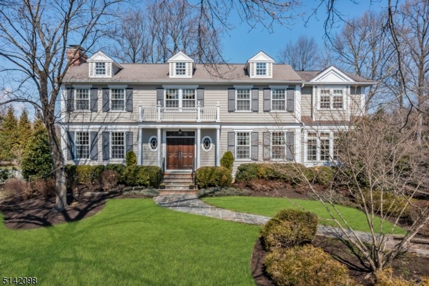 Trademark Builders custom home in Premier Wickham Woods neighborhood on highly desirable street. Incredible space/floor plan spread out over three fully finished levels. Gorgeous 2 story sun filled foyer with sweeping curved staircase welcomes you. Home offers 5 bedrooms all on the same level. 3 ensuite and 2 share a Jack & Jill bathroom. Vaulted ceiling in primary bedroom with private balcony and sitting room with fireplace. Primary bath has oversized shower, separate tub, two walk in closets and tons of natural light. Well thought out finishes and upgrades throughout the home.  Mahogany wood paneled office, upgraded windows, sun drenched first floor sunroom/second office with french door. First floor mudroom with back entrance, convenient laundry, entertainer's kitchen -2 dishwashers, warming drawer, high end appliances with eat in area surrounded by floor to ceiling windows, opens up to a large bluestone patio with outdoor kitchen and fireplace. Open concept family room with oversized stone fireplace. Butler's pantry with wine fridge leads to oversized formal dining room. Back staircase, arched doorways, closet systems, pristine HW floors throughout. Lower level has garage entrance, full gym, and large recreation room with fireplace. Custom bar with wine refrigerator, storage closets. 4 interior fireplaces, 1 exterior. 3 car oversized garage with electric car charger and generator hook up  to electric panel. Picture perfect FLAT & dry backyard! Meticulously maintained.