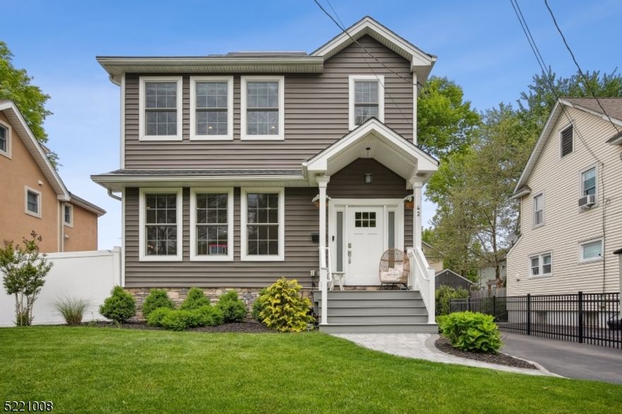 Looking for a newly built home in a charming neighborhood, bustling downtown, blocks from great schools & NYC transit? This home checks all your wishlist boxes. Upon entering, immediately feel welcomed by the abundant natural light gleaming through the open floor plan, 9ft, ceilings, hardwood floors, premium finishes & modern elegance.The expansive kitchen will stimulate your culinary senses, opening to the grand family room w/ gas fireplace, perfect for holidays. Upstairs, the master bedroom is a serene oasis, w/step-tray ceilings, custom built-in walk-in closet, luxury spa bath w/soaking tub & rain shower. The basement provides additional entertaining space, with a full bedroom with egress window, bath & den. Outside is a backyard oasis with turf grass and beautiful paver patio. Tesla solar powerwall reduces energy costs and the home is fitted with a level 2 EV car charger. The detached two car garage is equipped with Garage Tek wall paneling to maximize storage and add insulation, insulated garage door and two ceiling fans perfect for an at home gym. Moving to the suburbs, but don't want to sacrifice what you love? Look no further!