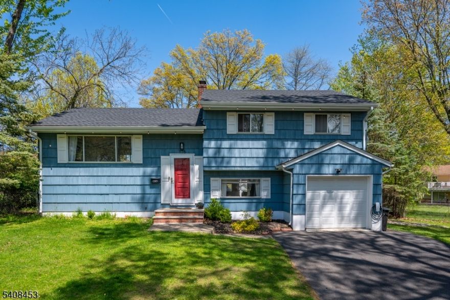 BACK ON THE MARKET!  BUYERS COULD NOT PERFORM. Appraised over asking price.  Welcome Home!  This turn key 3 bedroom, 1 1/2 bath split level home located in a most desirable neighborhood in the much sought after community of Parsippany is just waiting for you.  This property features a newly renovated kitchen with porcelain tile floors and gleaming quartz countertops.  The full bath is renovated and also features porcelain tile flooring.  A spacious living room, dining room and three bedrooms complete the main living area.  Downstairs you will find a large recreation room, laundry room with a half bath and access to the  garage.  Your new home also has a new roof, expanded driveway, and Spacious fully fenced in yard!