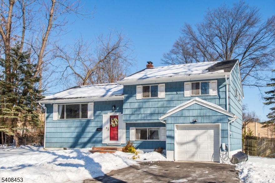 BACK ON THE MARKET!  BUYERS COULD NOT PERFORM. Appraised over asking price.  Welcome Home!  This turn key 3 bedroom, 1 1/2 bath split level home located in a most desirable neighborhood in the much sought after community of Parsippany is just waiting for you.  This property features a newly renovated kitchen with porcelain tile floors and gleaming quartz countertops.  The full bath is renovated and also features porcelain tile flooring.  A spacious living room, dining room and three bedrooms complete the main living area.  Downstairs you will find a large recreation room, laundry room with a half bath and access to the  garage.  Your new home also has a new roof, expanded driveway, and Spacious fully fenced in yard!