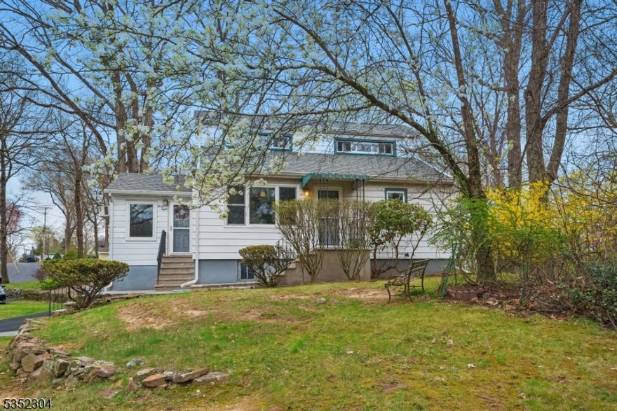 Charming Expansive Cape on Lovely Corner Lot in the Rock Ridge Lake community! So many great features and updates. Hardwood Flooring Throughout. Bright living room with a picture window welcomes you in. Renovated Eat-in Kitchen with Stainless Steel Appliances. The eating area boasts high, vaulted ceilings. Large family room with wood burning stove walks out to the back patio. Neutral, ceramic tiled bath w/ tub shower and convenient first floor bedroom. Upstairs, offers two generous sized bedrooms & a 2nd full bath! Storage in attics, unfinished basement and shed; a real bonus! Level, large Corner lot for play & relaxation- an GREAT Find in Prime Commuter Location yet in a quiet and wooded Lake community bordering Boonton Township. Close proximity to NYC Midtown Direct train/bus, easy access to Rt 80, 10, 46, 287, and bustling Downtown Denville & Boonton Main Street with their shops, bars, brewery, coffee, events, art, etc! Join the Lake and use the beach, clubhouse, bar, Hub Lakes sports & year-round activities for all ages! Swimming, fishing, boating galore. Great school system, great community, great property!