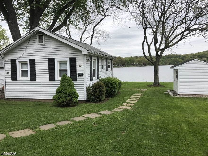 LAKEFRONT, LAKEFRONT, LAKEFRONT. Enjoy the amazing views all year long from this quaint lake front cottage. Enjoy privacy of the single family structure, with a private yard .Tenant responsible for snow removal up to 3 inches, anything more the landlord will take care of. Enjoy the close proximity of the train station, bus stops, shopping, rt 206, rt 46, rt 80 and rt 10. 8 x 8 Shed available to tenant for storage. See documents for lease obligation to be added to lease. Park on left side of driveway only.