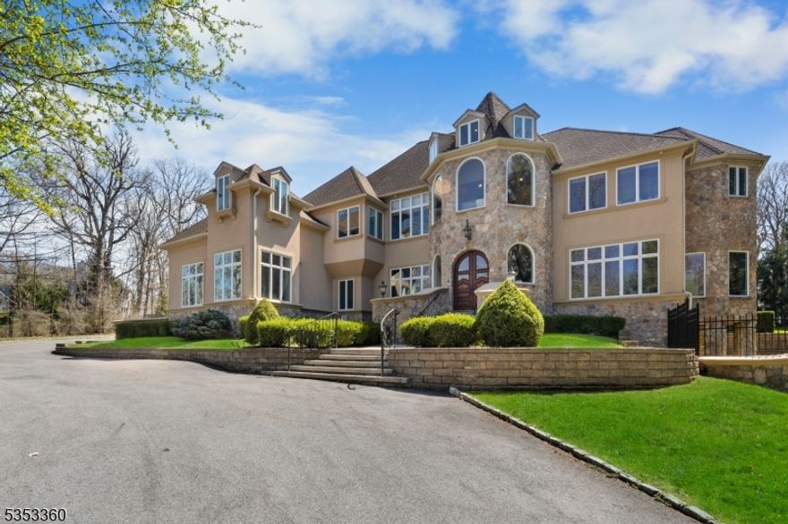 Step into a world of unparalleled elegance and sophistication at this extraordinary custom hard coat stucco estate. The grand circular driveway sets the tone for what awaits you. The stately mahogany double doors, a soaring foyer with a breathtaking staircase adorned with intricate wrought iron railings, and an architectural masterpiece that hints at the craftsmanship found throughout the home. The heart of the residence is a chef-inspired gourmet kitchen, designed to entertain on a grand scale with top-tier appliances, expansive countertops, and a generous island, this space opens seamlessly into the dramatic great room, framed by floor-to-ceiling custom windows and stonework bringing the outdoors in with a flood of natural light. Work from home in style in the private first-floor office, or retreat to the sprawling primary suite, a sanctuary featuring a walk-in closet, spa-like bath, and privacy. Additional highlights include a private guest suite with a separate entrance, ideal for guest living or extended stays. The finished walk-out lower level offers a full bathroom and endless ideas for entertainment, fitness, or relaxation. Car enthusiasts will appreciate the 4-car garage, while organizers will swoon over dual custom walk-in mudroom closets. Step outside to your private resort-like backyard, an entertainer's dream. Lounge beside the heated, in-ground saltwater pool, shoot hoops on the basketball court, or let the little ones enjoy the custom playground. See you soon!