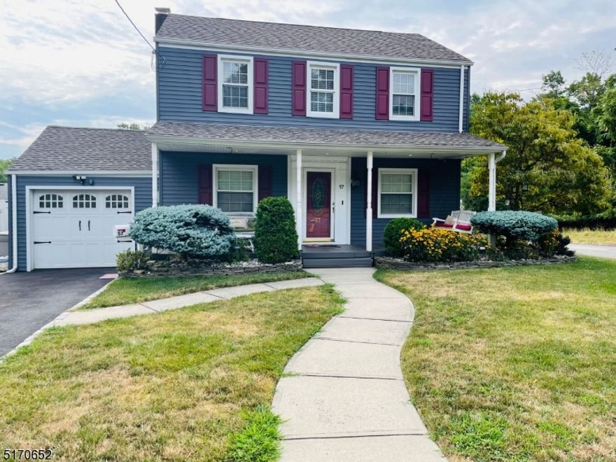 What a gorgeous home and great location for this 4 bedroom, 3 full bath single family Colonial home!  Beautiful kitchen with stainless steel appliances, living room, formal dining room and family room with gas fireplace.  Open the sliding door in the kitchen to your completely fenced in backyard with a pool for all your summer enjoyment!  Gleaming wood floors throughout!  House includes washer and dryer.  Relax on the front porch swing with your morning coffee.  There's an attached garage and driveway.