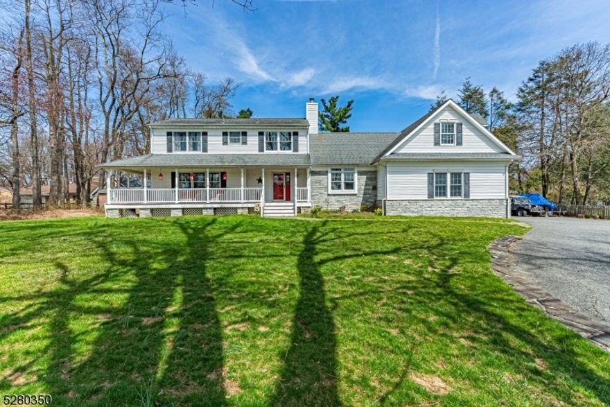Special Find! Custom Farmhouse Style Colonial on 1 Acre. Curb appeal plus, classic white exterior with red door and "rocking chair  front porch overlooks Denville's historical Union Hills Farms. Large, level yard with deck and in-ground pool. Abundance of living space with a traditional and warm design. Many rooms to accommodate a versatile lifestyle; handsome entertaining space, large family room with high ceilings and a stunning floor to ceiling stone, wood burning fireplace. Formal living room and dining. Convenient powder room. Functional eat in kitchen with stainless steel appliances. Wide plank hardwood floors. Upstairs 4 generous sized bedrooms and 2 full baths include the primary suite. Bonus den with vaulted ceilings, great office or playroom. Tons of storage in an oversized 2 car garage, attic, two large sheds & full basement. Basement offers a ton of potential. Backyard OASIS - Perfect for Entertaining & Relaxation! Enjoy the pool or lounge on the deck, patio or charming porch. Walk to School. Desirable location, easy access to major highways & NYC Direct Mass Transit, Downtown Denville, Morristown and Union Hill shopping center. Public utilities!