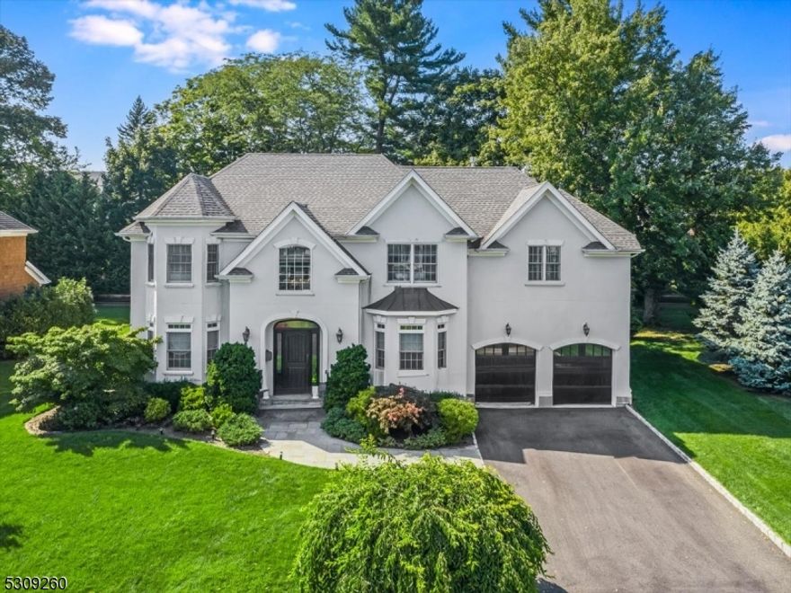 One word to describe this beautiful custom built home in Westfield " Wow!  Owners have meticulously created a fun, upscale oasis that exudes personality. From the moment you enter this home you'll find that no detail has been overlooked and all finishes are timeless, yet on trend.  Eat-in chef's kitchen, with a large center island, 6 burner gas range, and 2 ovens opens to an oversized family room with a double-sided gas fireplace. Indoor/outdoor entertaining is made easy in this home " a large, inviting dining room perfect for holiday gatherings, a dry bar with wine fridge, and sliders right off the kitchen that lead to a large bluestone patio overlooking the lushly landscaped backyard, complete with hot tub, electric dog fence and underground sprinklers. Mud room and a showstopper living room complete the 1st floor. On the 2nd floor, you'll find 4 oversized bedrooms, a laundry room and a jaw dropping primary en-suite with a cathedral ceiling, gas fireplace, walk-in closet and a stunning bath. Last stop is the large open basement that offers multiple rec areas for games, TV watching, exercise, your call!  Full bath and bonus office/bedroom gives you flexibility to use the space as needed. This is truly a one-of-a-kind home. Too many offerings to name