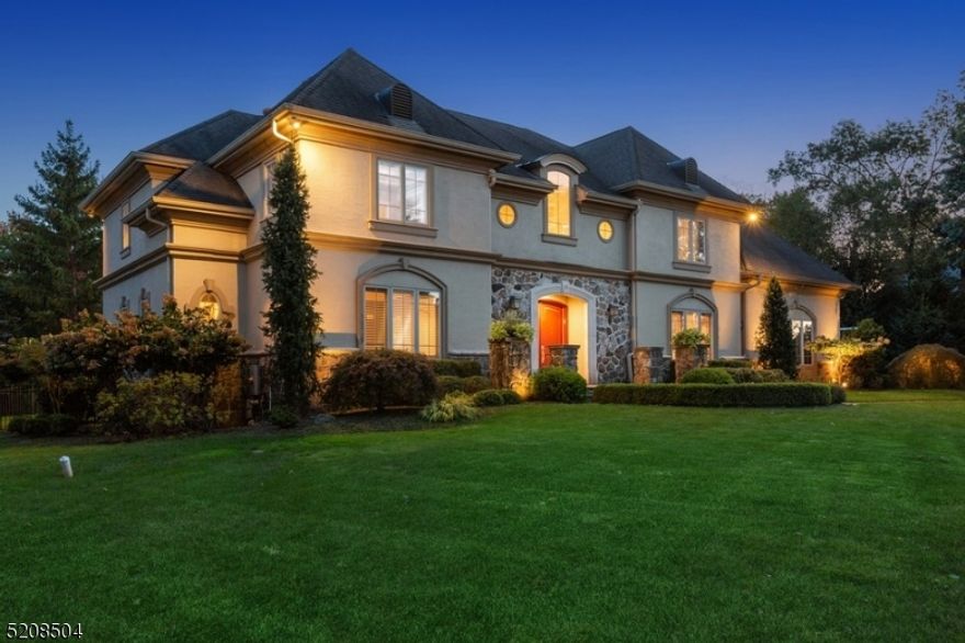 Set in a prime location in coveted Governor Hill, this stunning custom home combines warmth, comfort, luxury, and elegance. The grand entry foyer sets the stage for what's to come. The main level of the home boasts a dramatic great room with a grand fireplace, a library, an oversized formal dining room, and a perfect living room with a flow designed for hosting dinner parties and gatherings. Chefs will delight in the spectacular kitchen with a breakfast area that overlooks the pool and manicured grounds, making indoor/outdoor entertaining and enjoyment ideal. The kitchen features top-of-the-line stainless steel appliances, custom cabinetry, and a large center island. The private outdoor paradise results from the owners' vision and passion, custom crafted for relaxation, play, and entertaining. The stunning pool, spa, outdoor kitchen, and multiple seating areas, provide a pristine setting. Each room on the bedroom level is special. The primary suite is a wonderful retreat with a large sitting room, cozy fireplace, twin walk-in closets, and a spa-like bathroom. The finished lower level offers a large recreation room with a bar, gym, fifth bedroom, and full bathroom. This masterpiece offers luxury, comfort, and elegance in equal measure. Don't miss the opportunity to own this dream home in one of Livingston's most coveted locations.